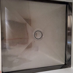 After stainless shower tray