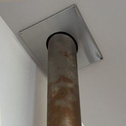 Before heat stained chimney flue