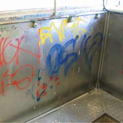 Before graffiti removal from urinal