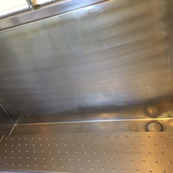 Before stainless urinal with uric acid build-up